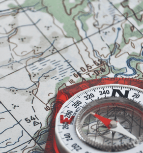 Magnetic Compass lying on map