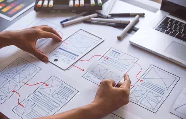 Designer working on a prototype wireframe